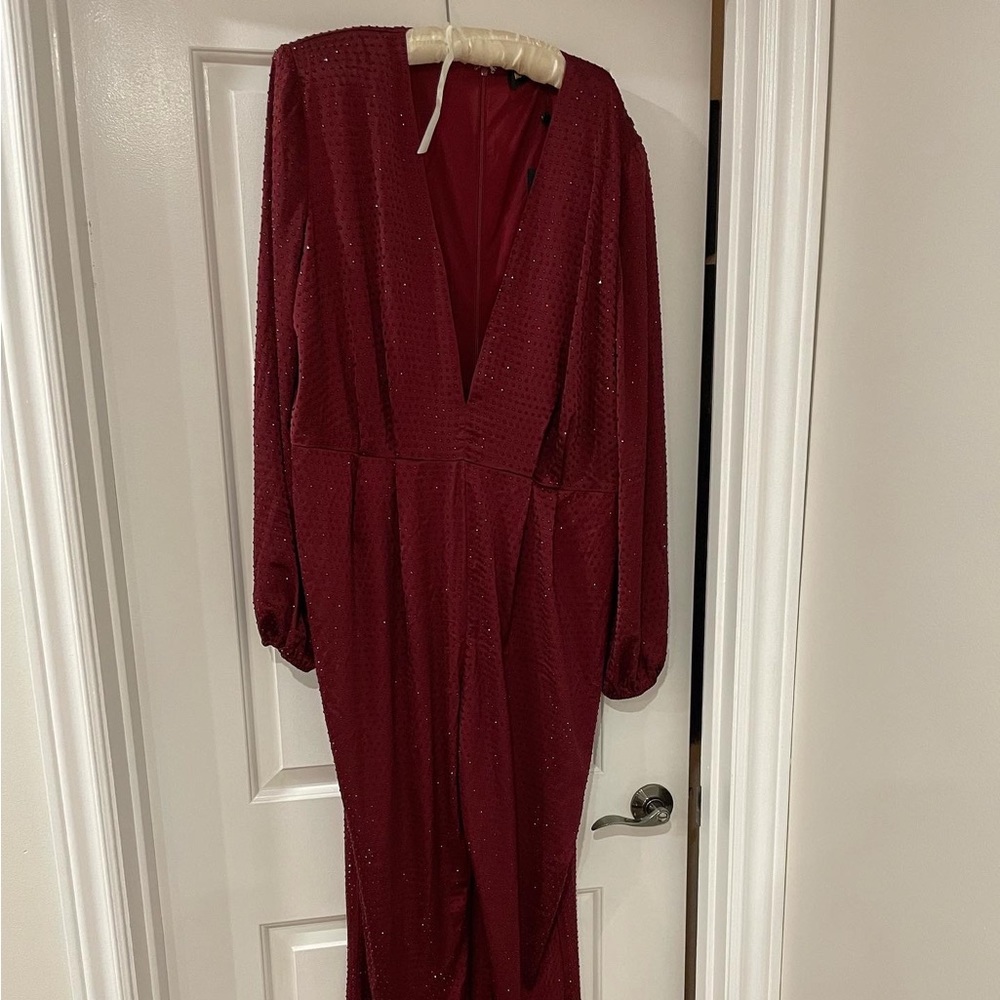 Embellished shoulder pad jumpsuit never worn with tags.